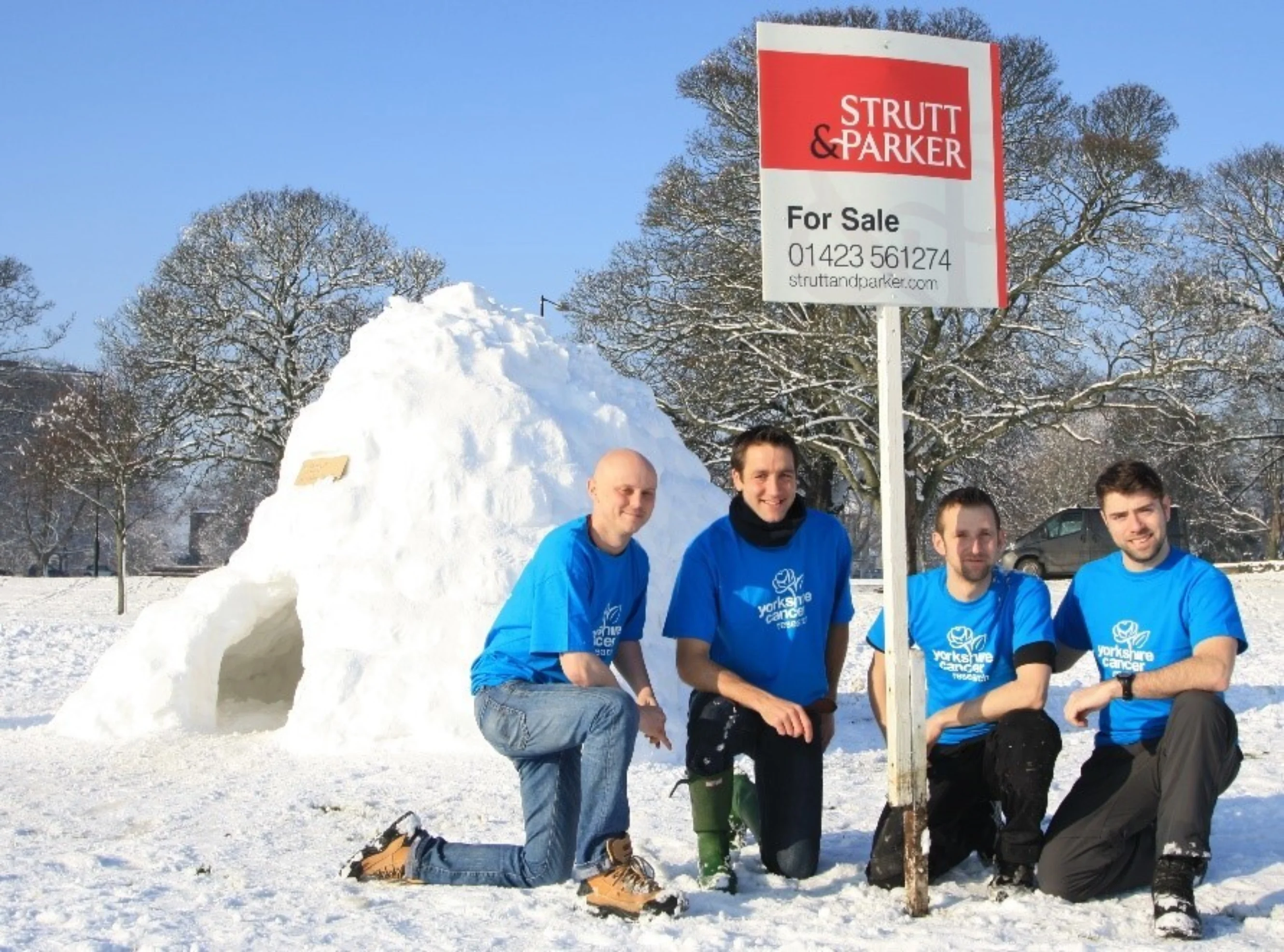 Craig, Greg, Mark and Carl in front of their igloo