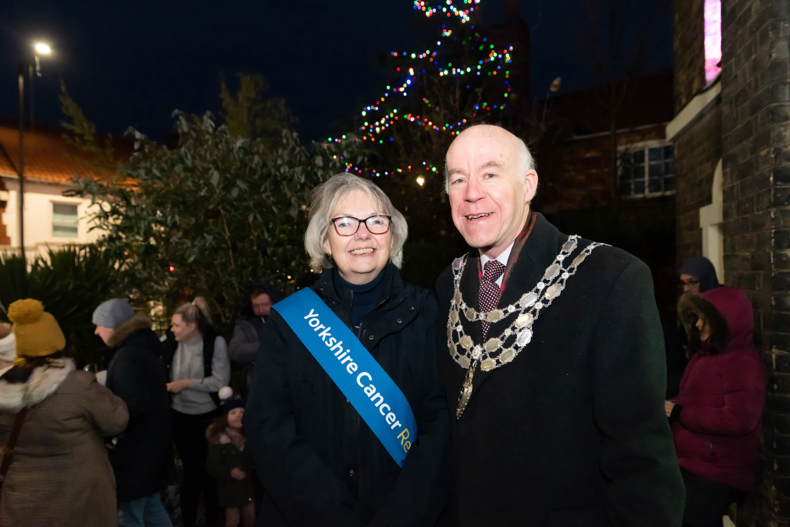 Kay and the Mayor in front of the Selby Tree of Light