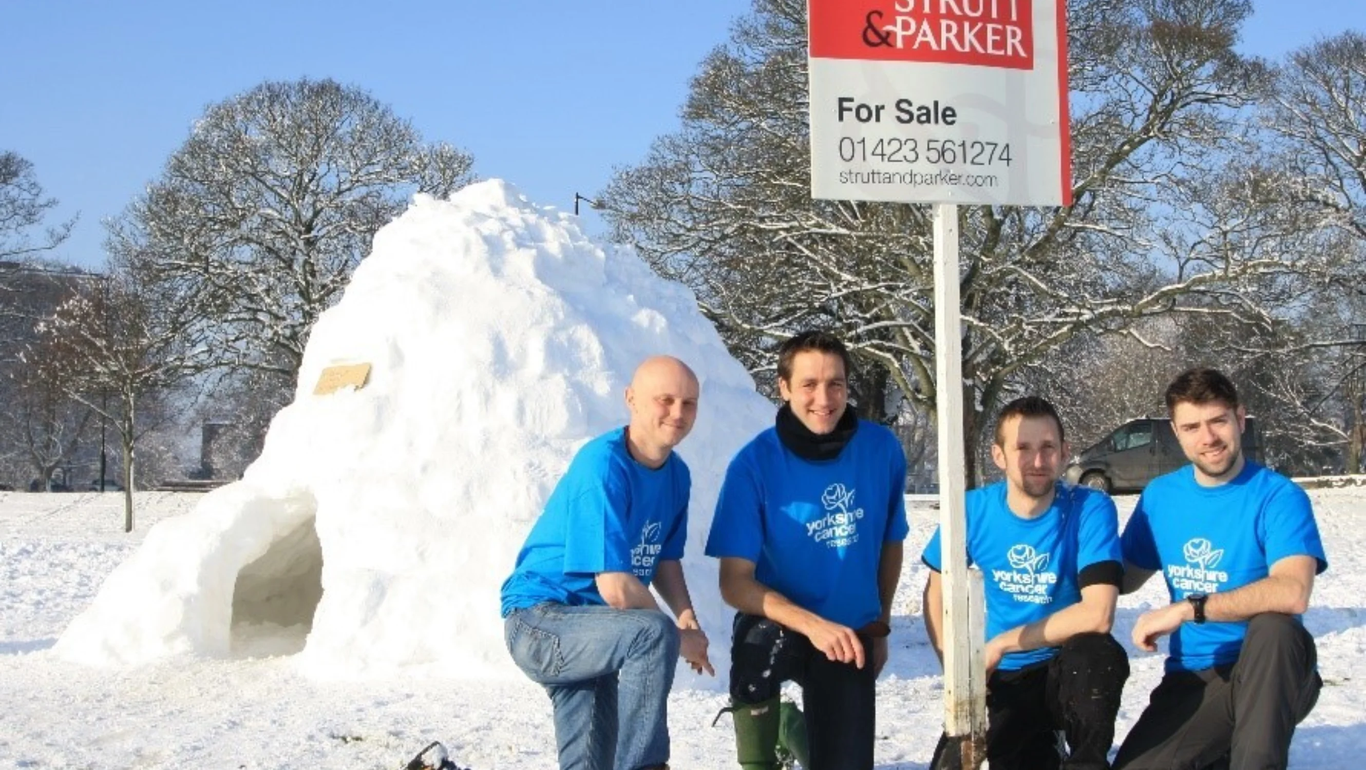 Craig, Greg, Mark and Carl in front of their igloo