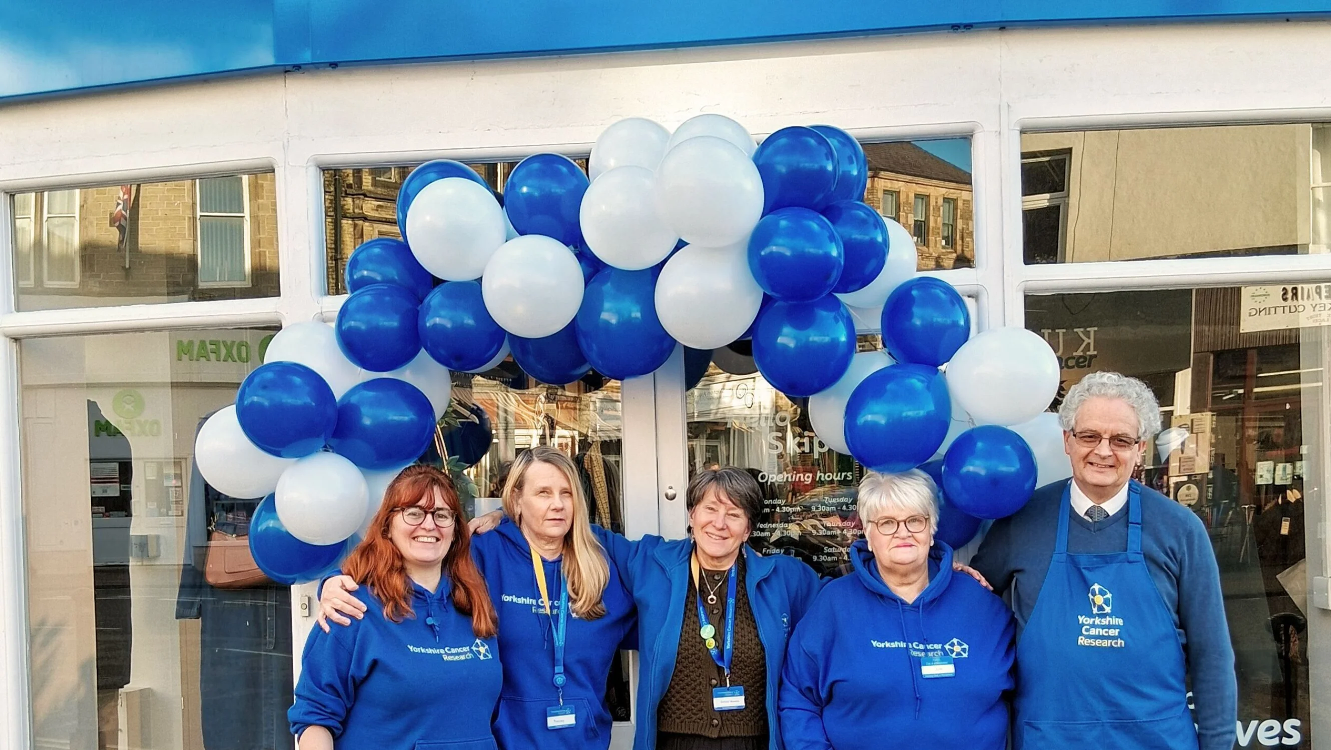 Skipton team gathered in front of the new shop