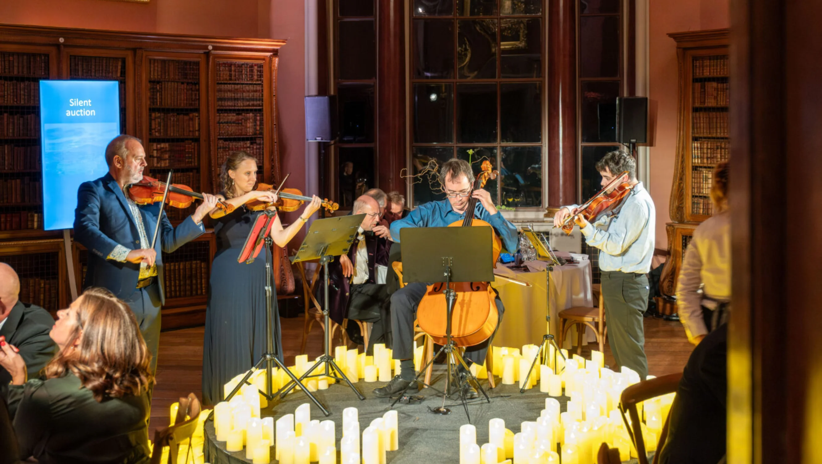 The string quartet playing music