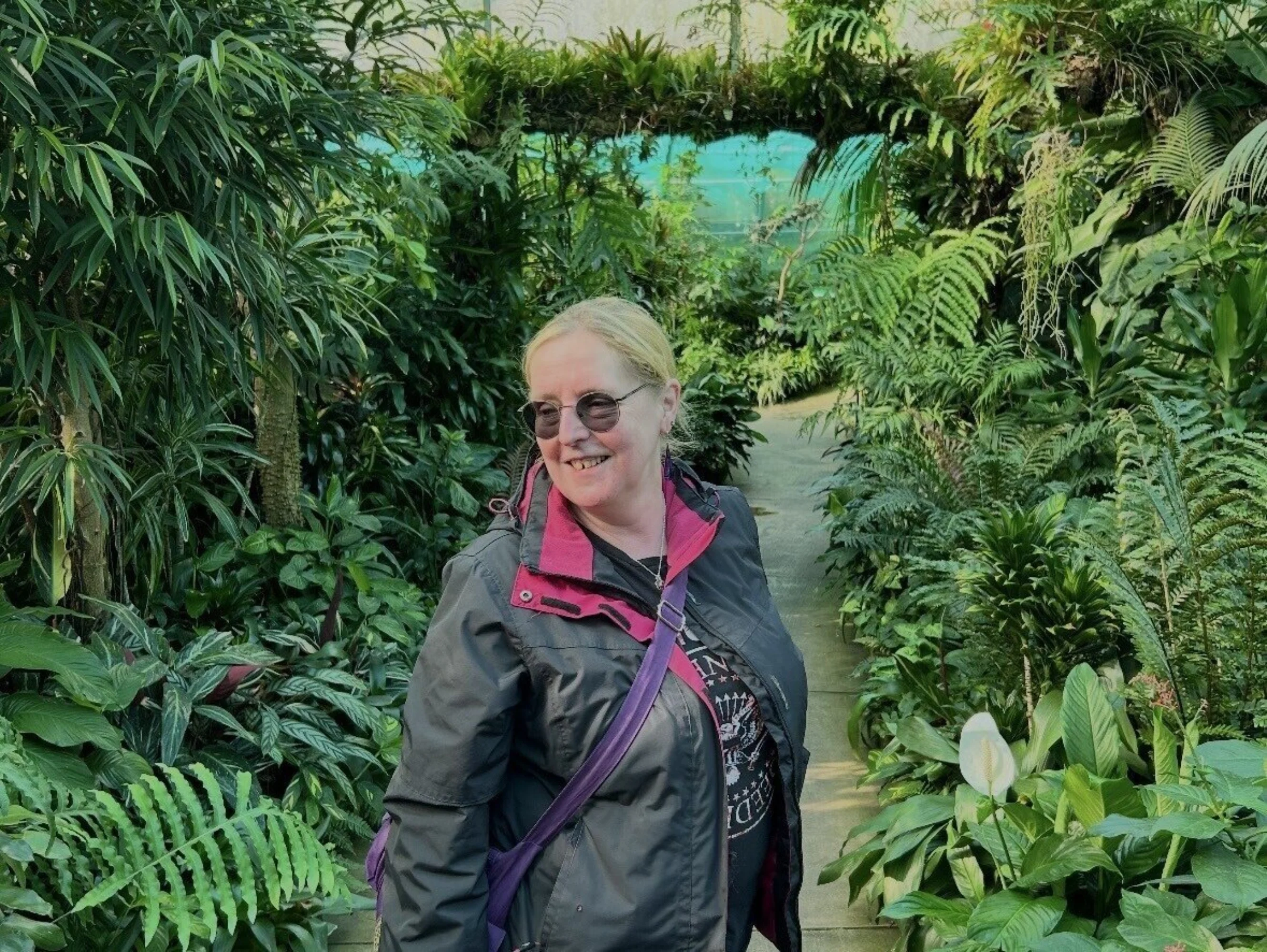 Chris is surrounded by greenery in Duthie Park in Aberdeen.