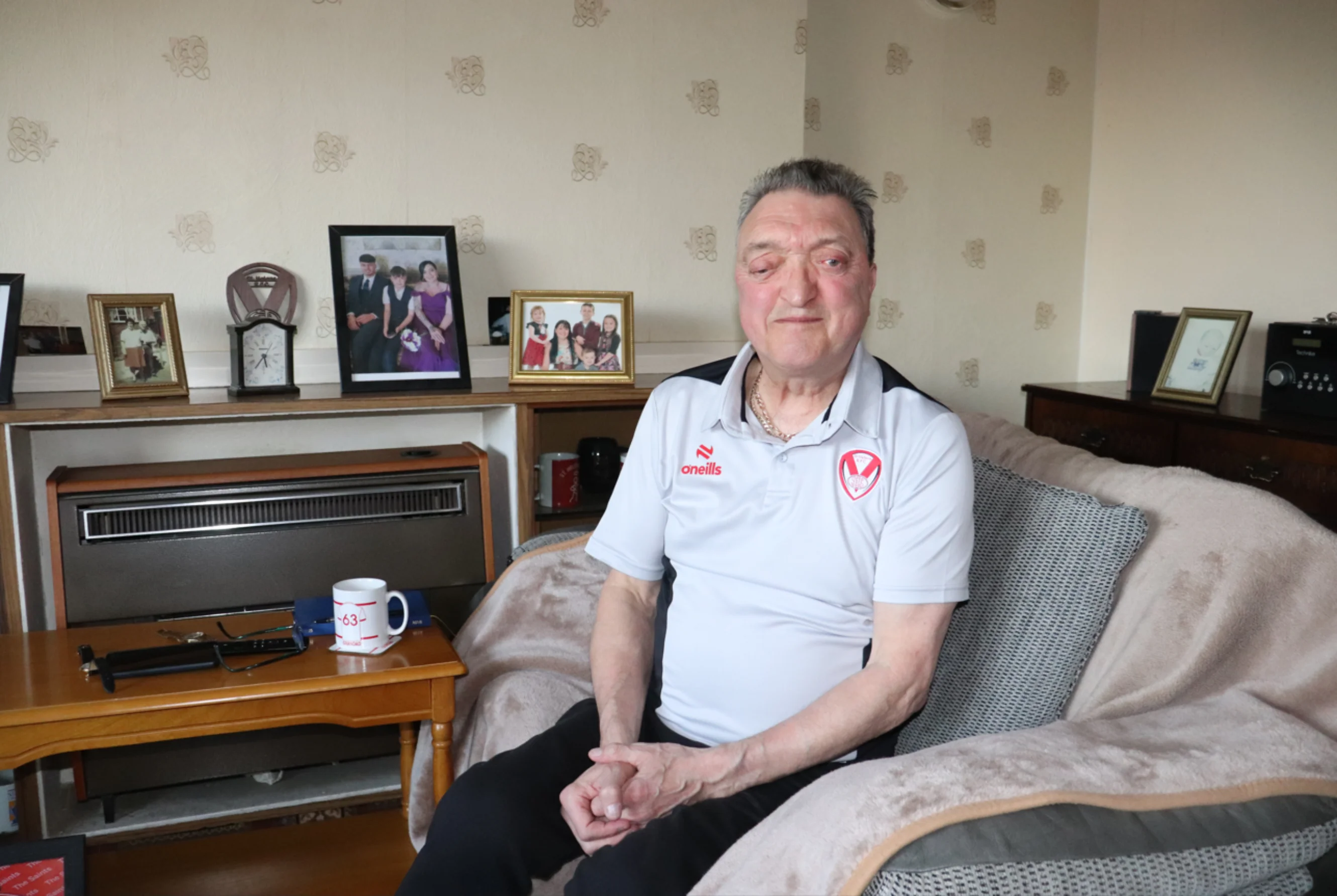 John Hallatt sitting in his home in Bramley