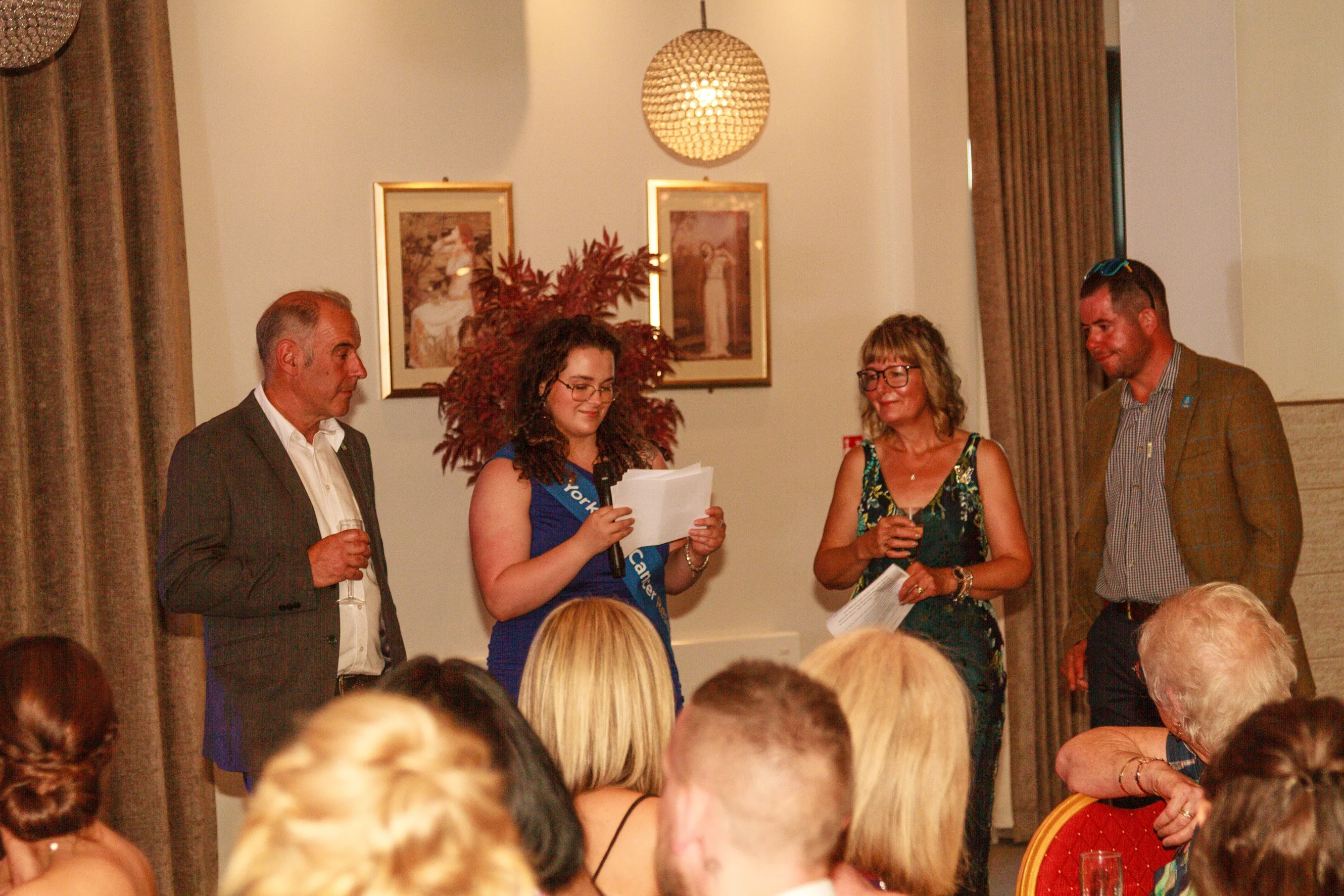 Team Bowser's speech joined by a Yorkshire Cancer Research employee.