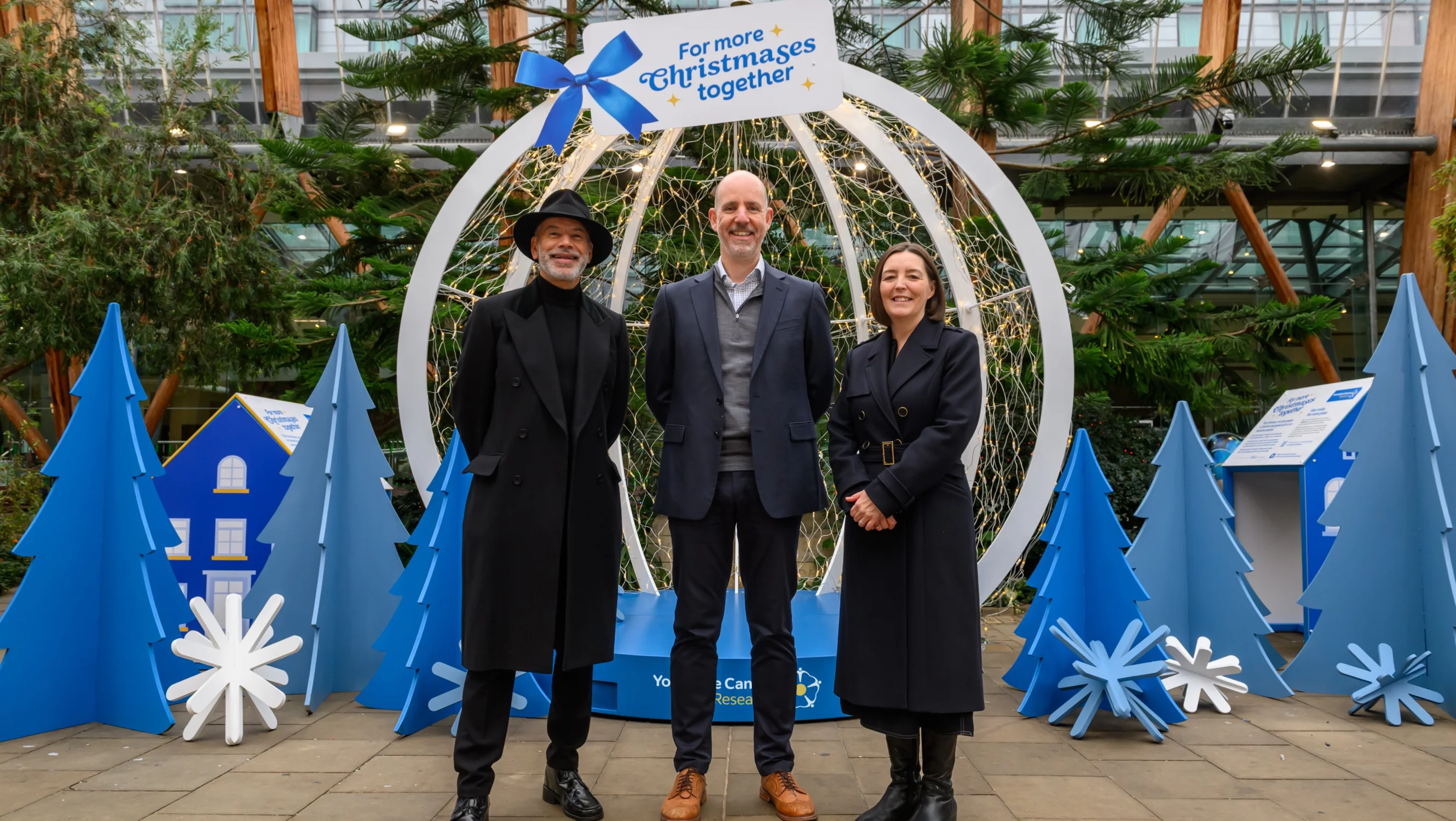 Russel McFarlane, Dr Jim Catto and Dr Kathryn Scott in front of the snow globe