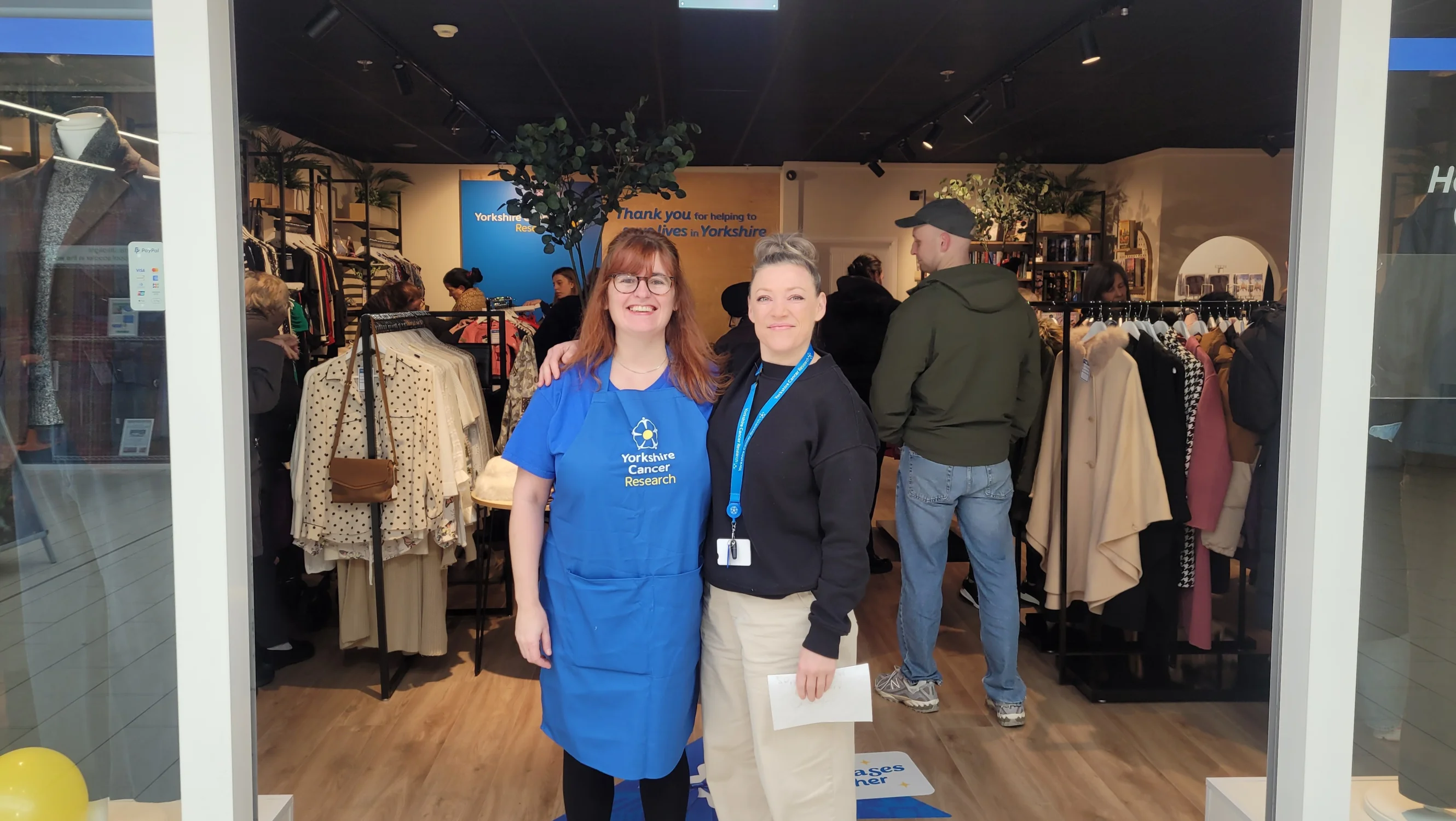The friendly shop team in the front of the new Yorkshire Cancer Research shop in Sheffield