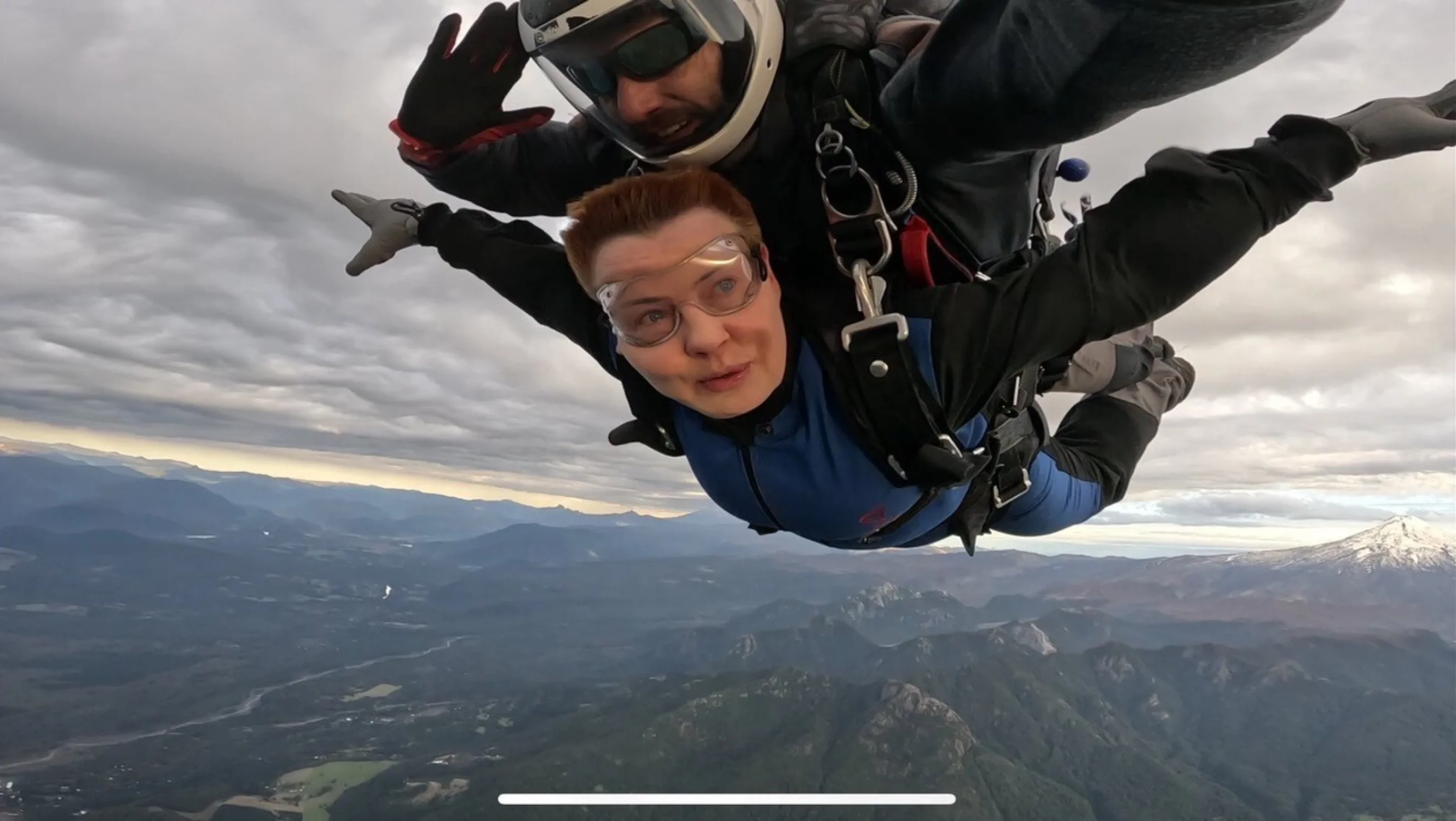 Woman skydiving.