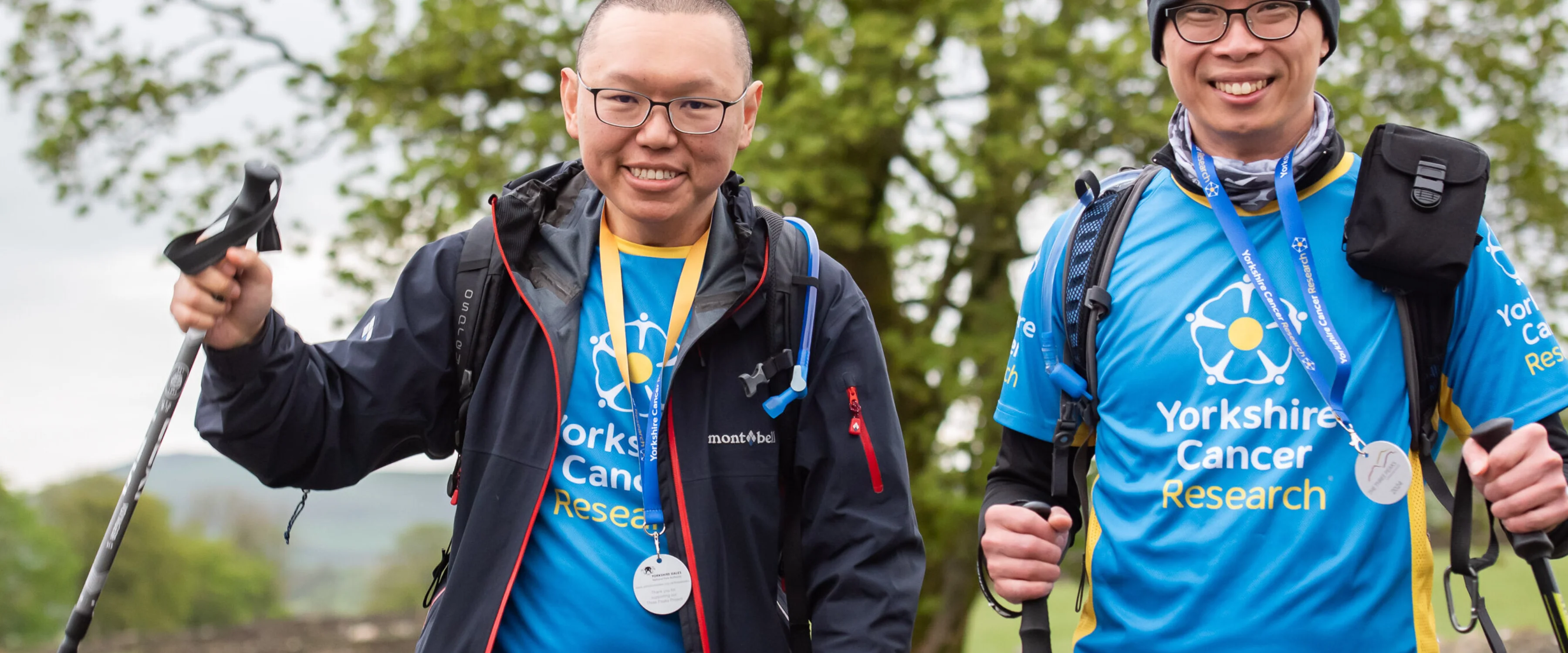 Two fundraisers celebrating the end of their hike