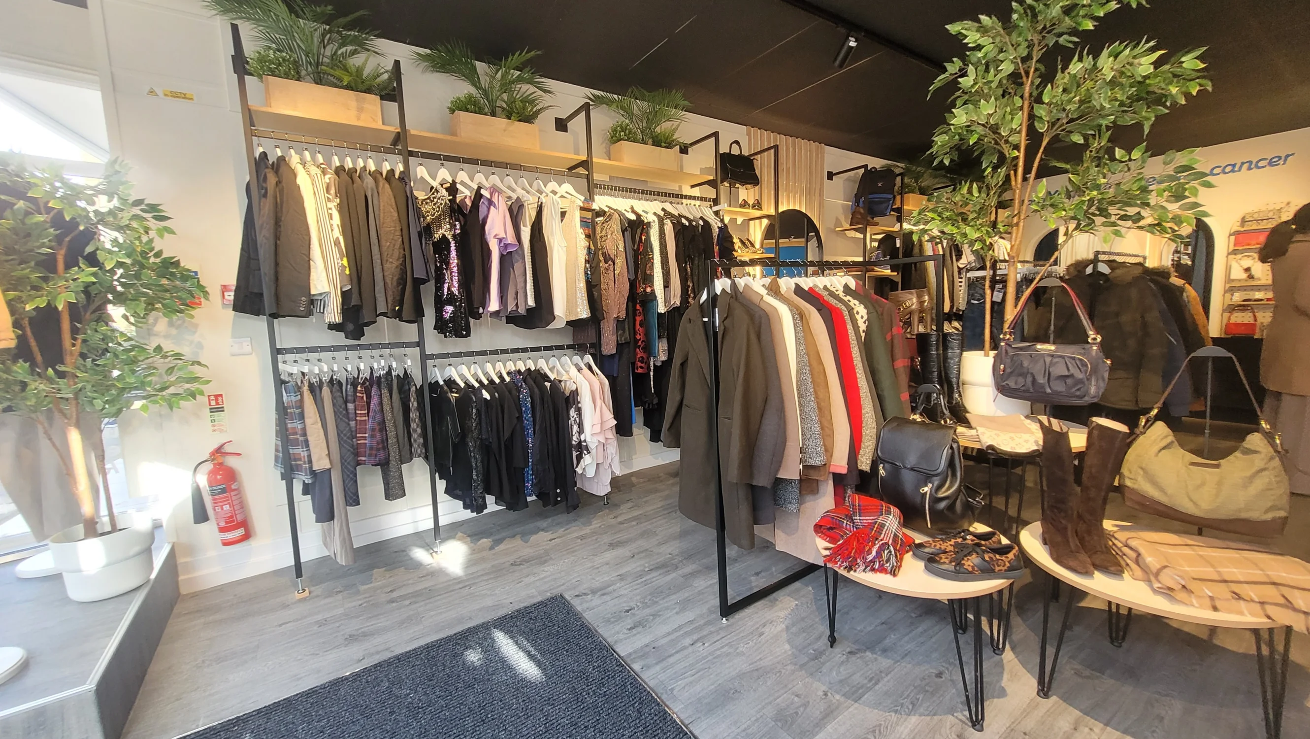Inside the Skipton Keighley Road shop, a display of ladies' clothes and accessories