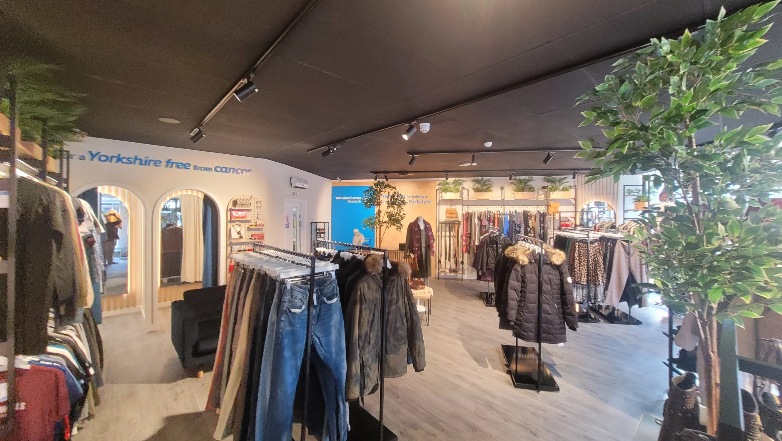 Inside the Skipton Keighley Road shop, racks of mens and woens clothes are neatly organised and displayed