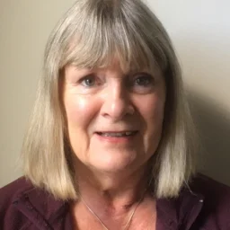 A lady with a long bob and fringe