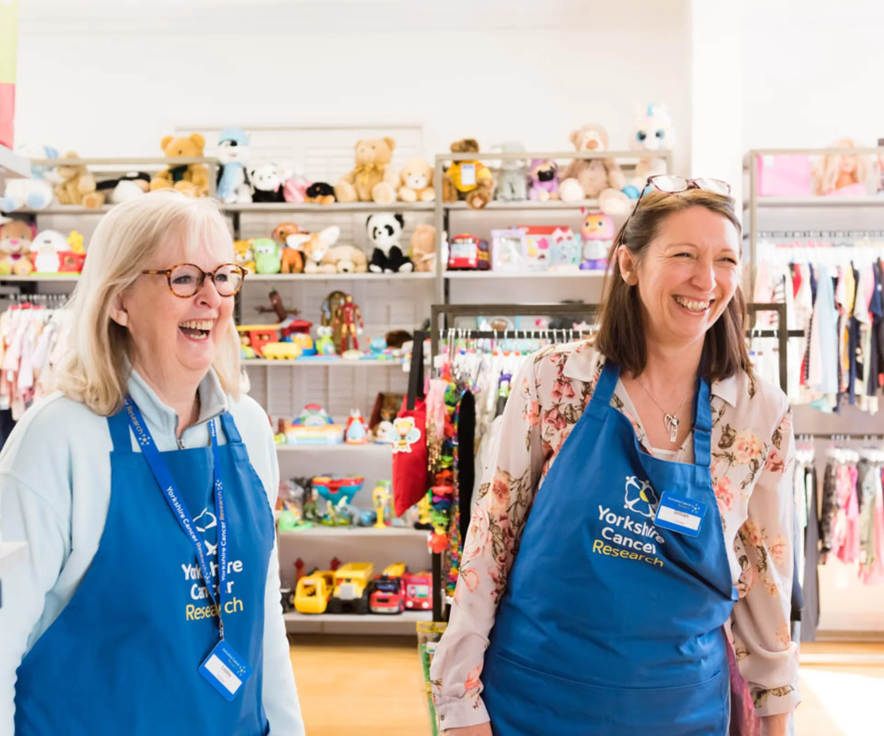 Two volunteers inside the Skipton Shop
