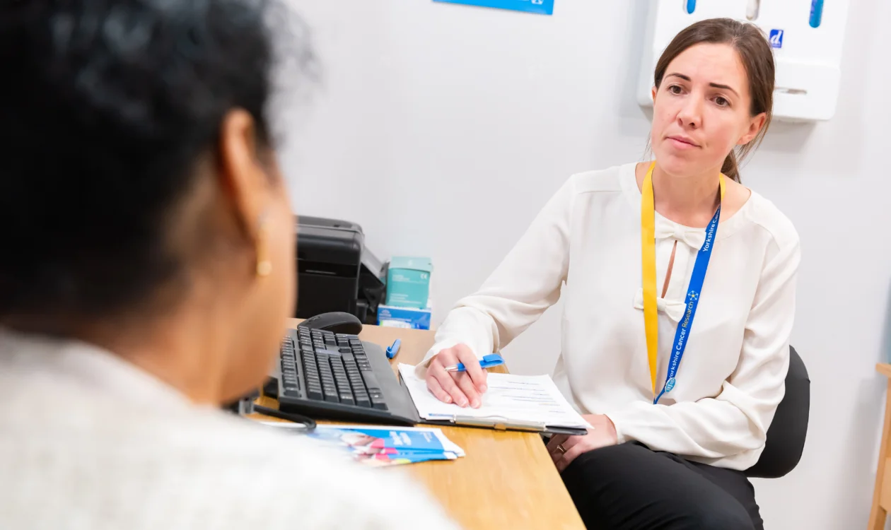 Female GP speaking to a patient