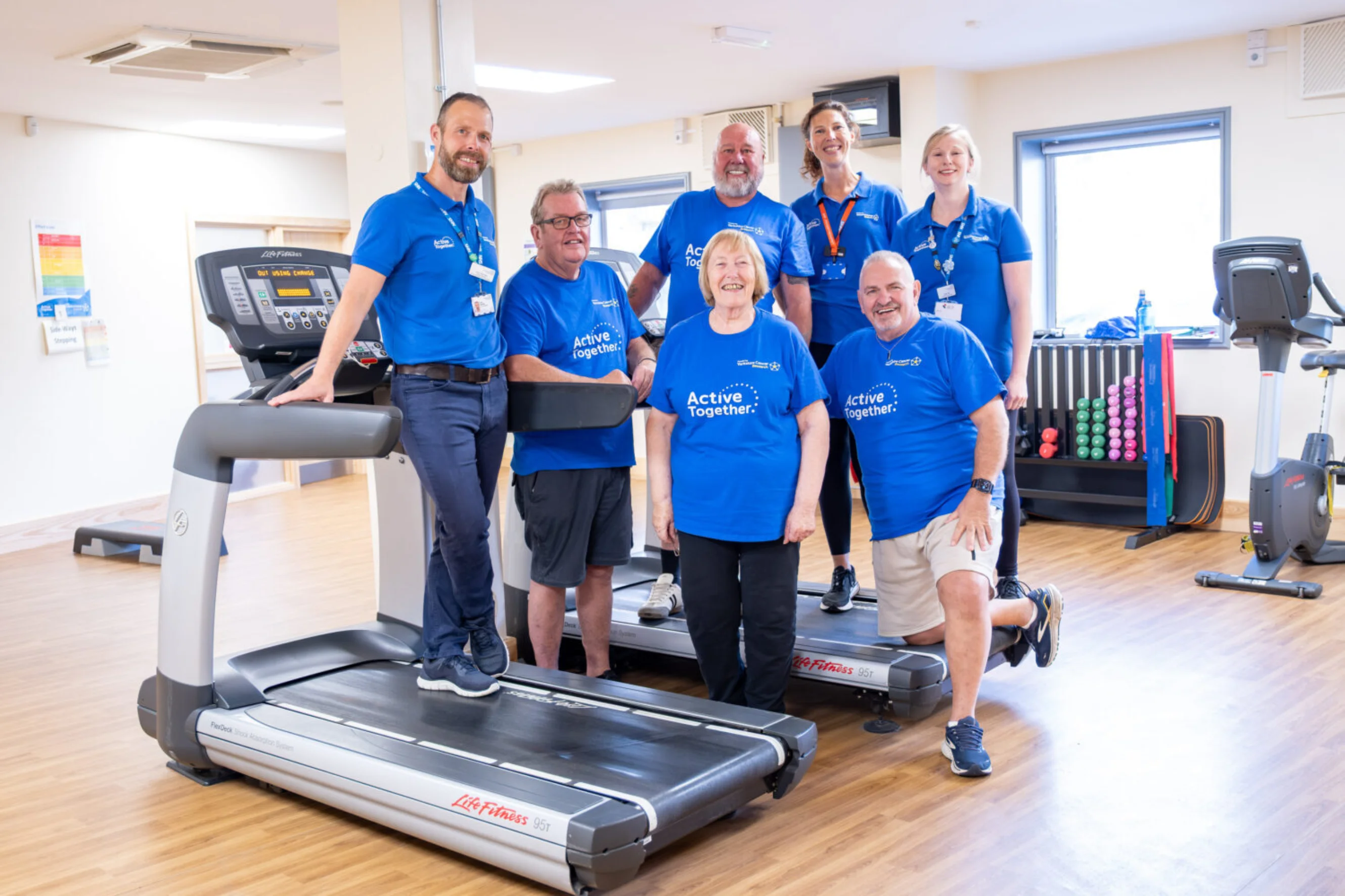 from left, John Brinkley, Therapy Manager and Service Lead for Prehabilitation and Rehabilitation at Montagu Hospital, with Active Together participants George McCue, David McLean and Vivien M’Itwamwari, Hannah Proctor, Specialist Physiotherapist at Active Together Doncaster, Active Together participant David Bottomley and Lydia Salt, Specialist Physiotherapist at Active Together Doncaster.
