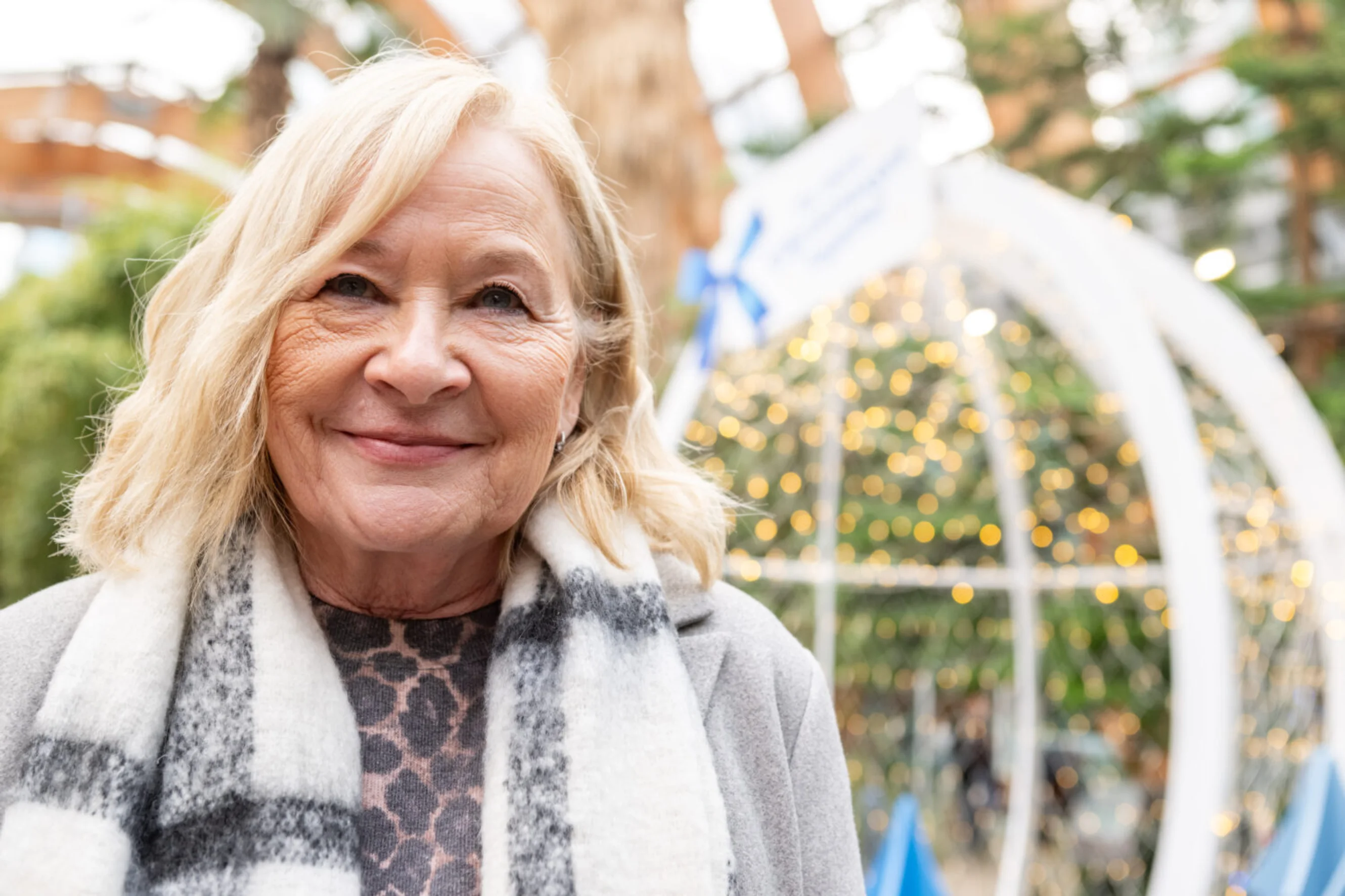 Lesley Penty in front of the snow globe
