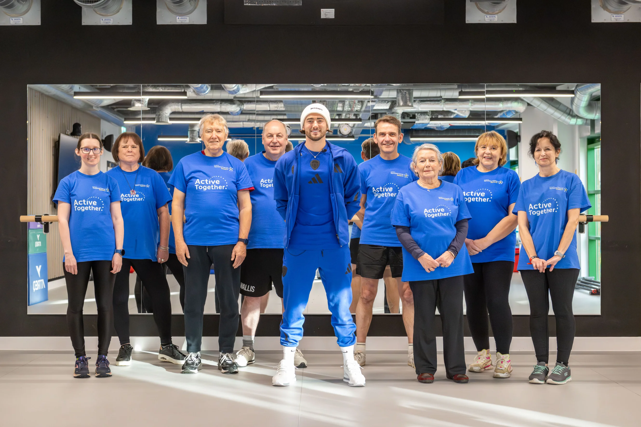 Leeds United's Jack Harrison with Active Together members