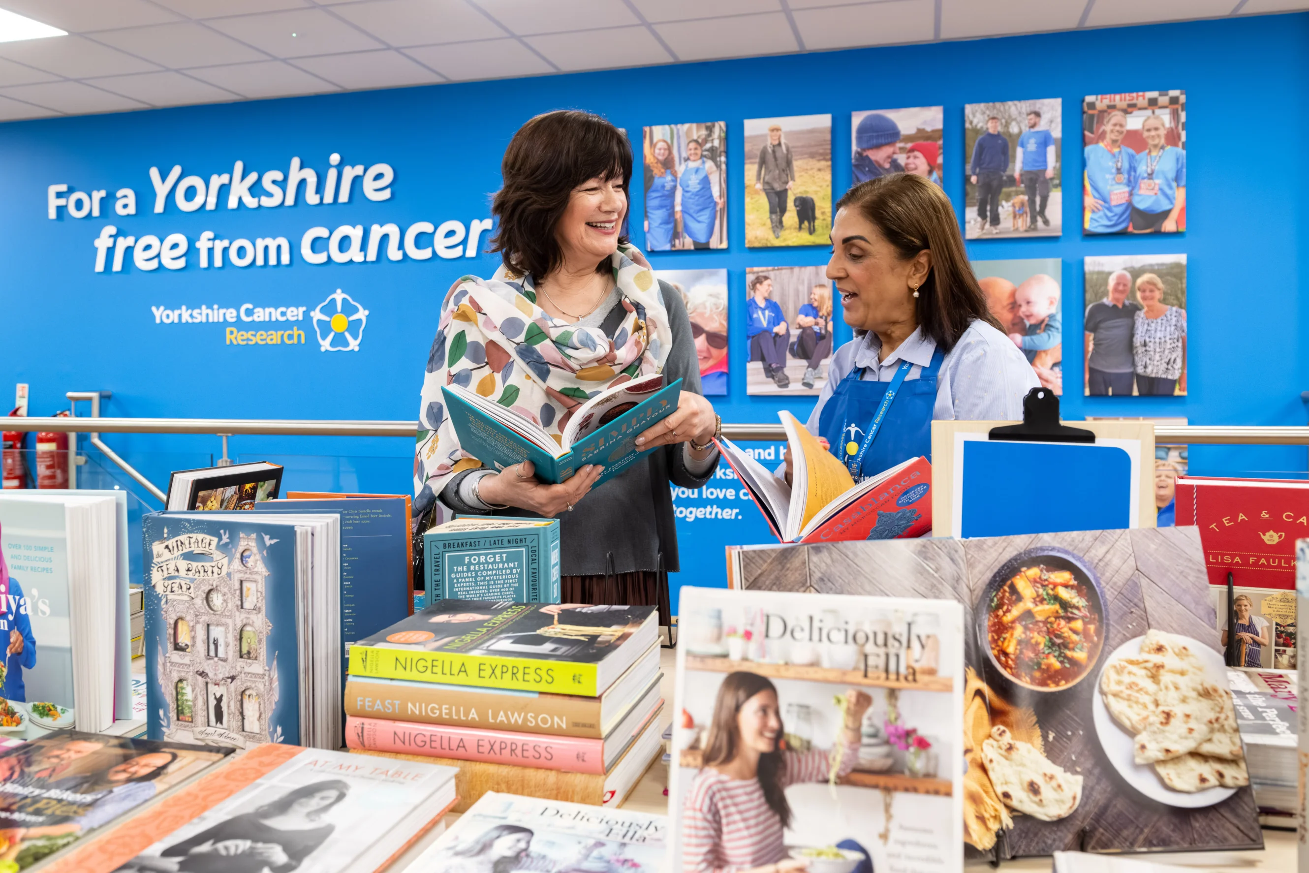 Volunteers in the cookery book section at the York superstore