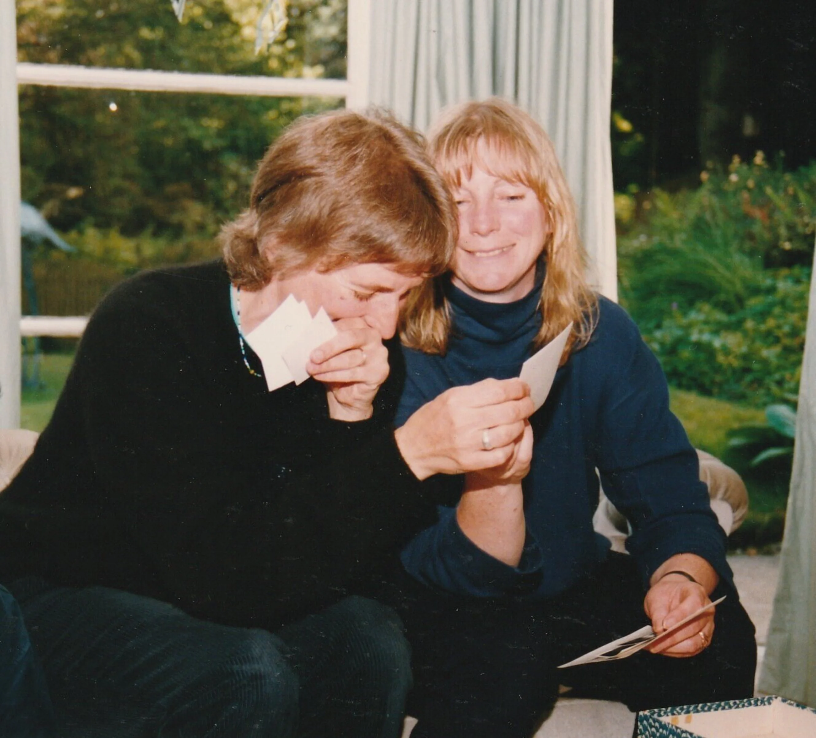 Sue and Polly laughing at photos 1993