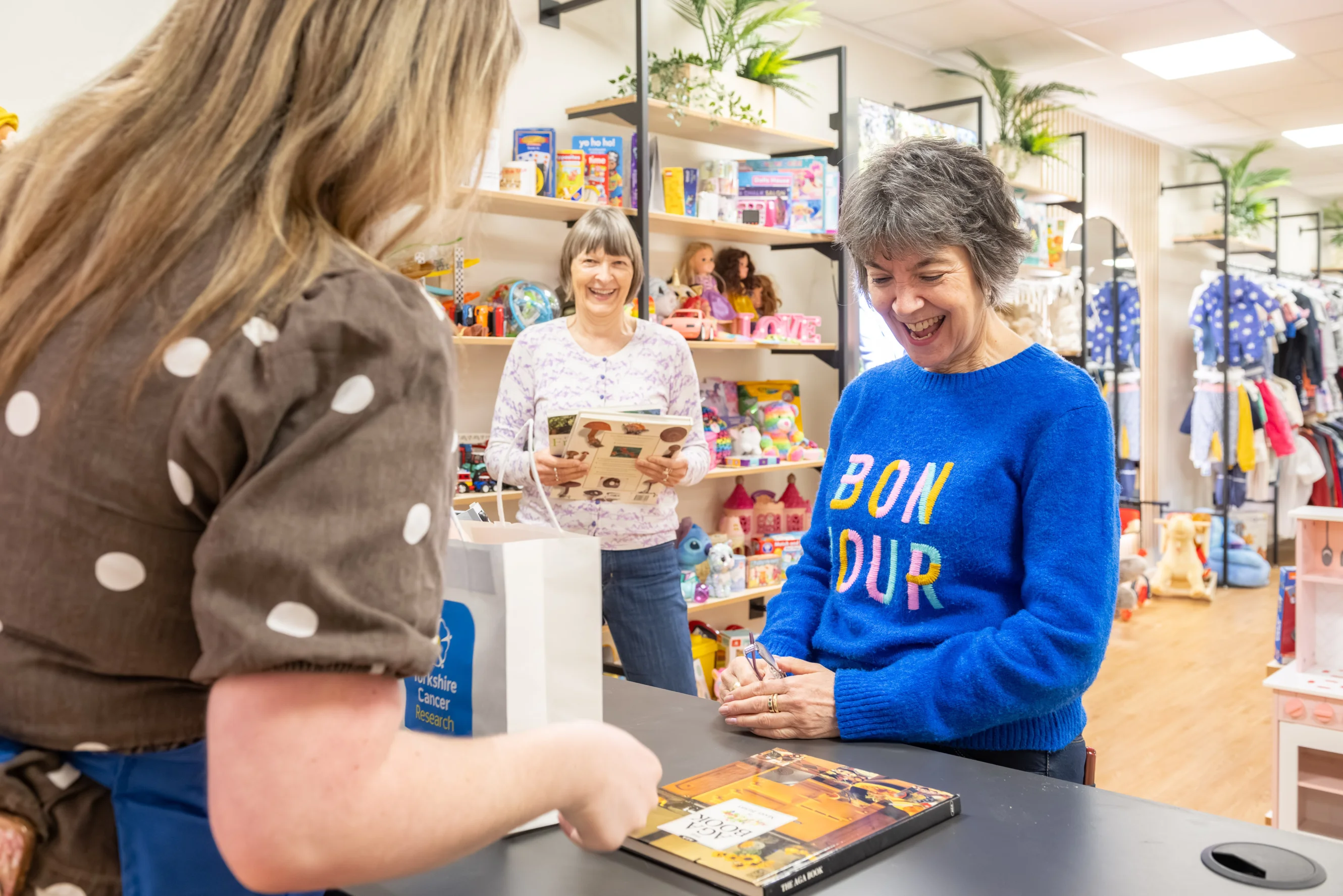 People buying donated items in York superstore