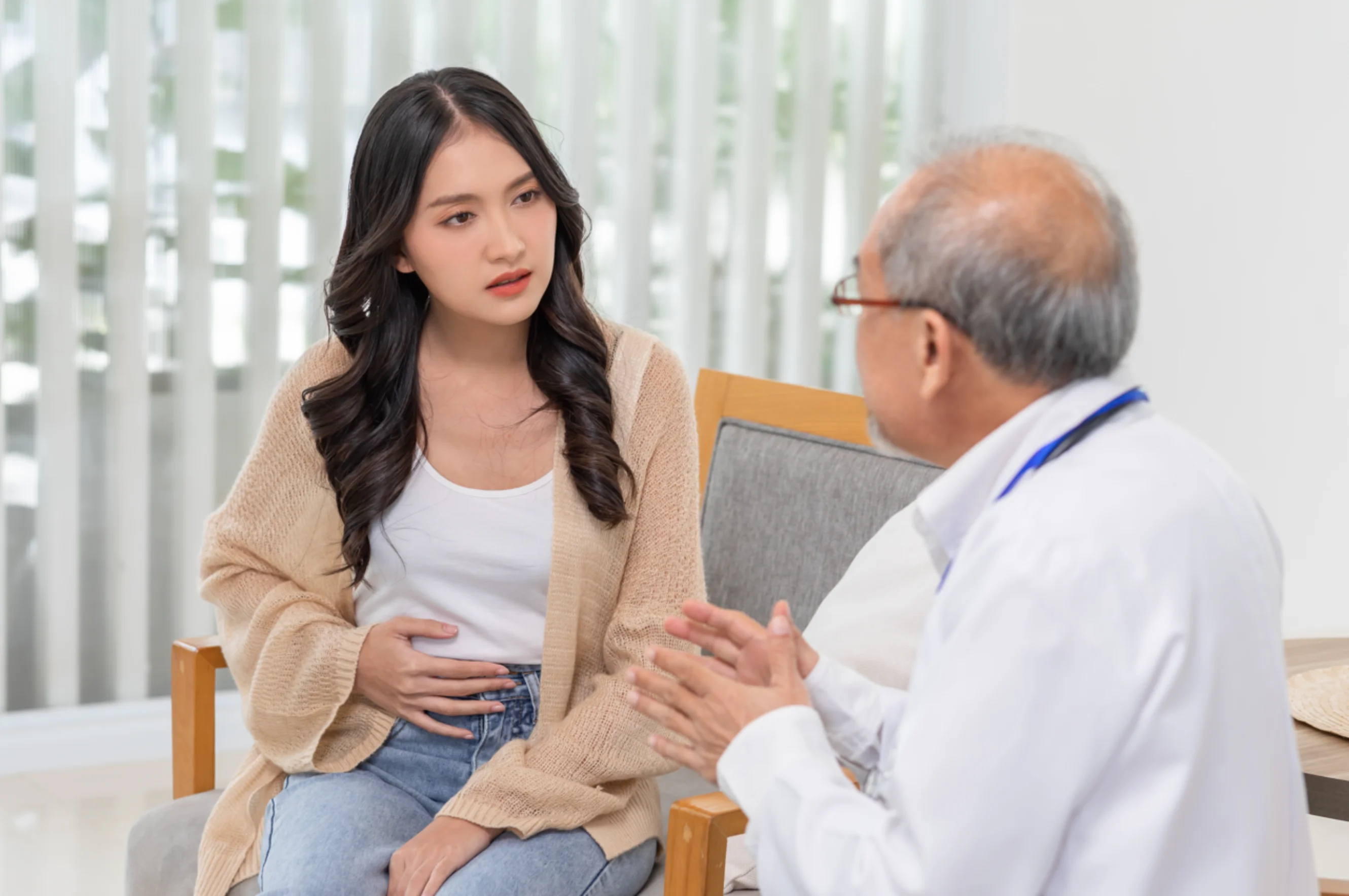 A woman in consultation with her doctor