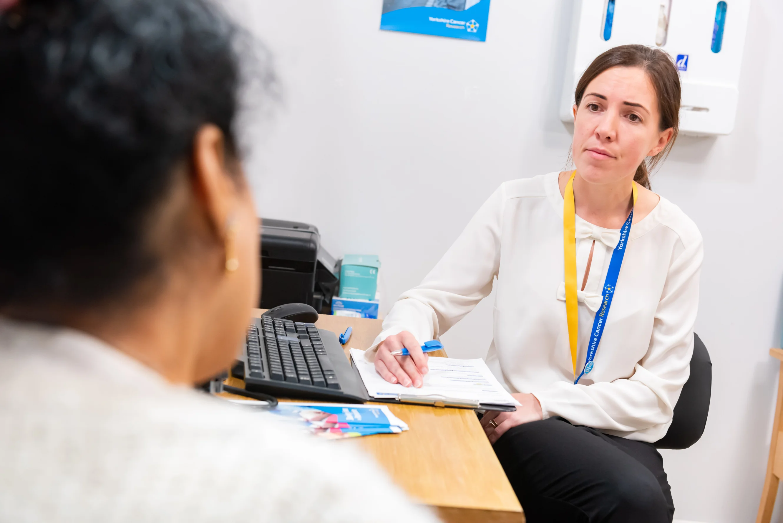 Female GP speaking to a patient