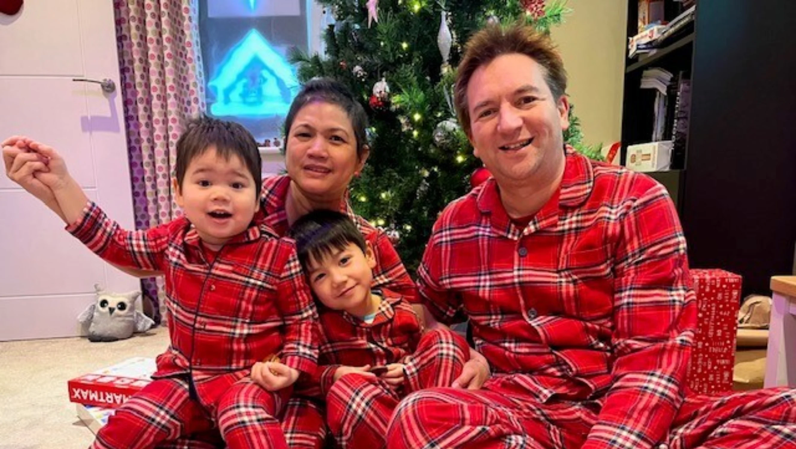 The Umpleby family sat in their Christmas pjs