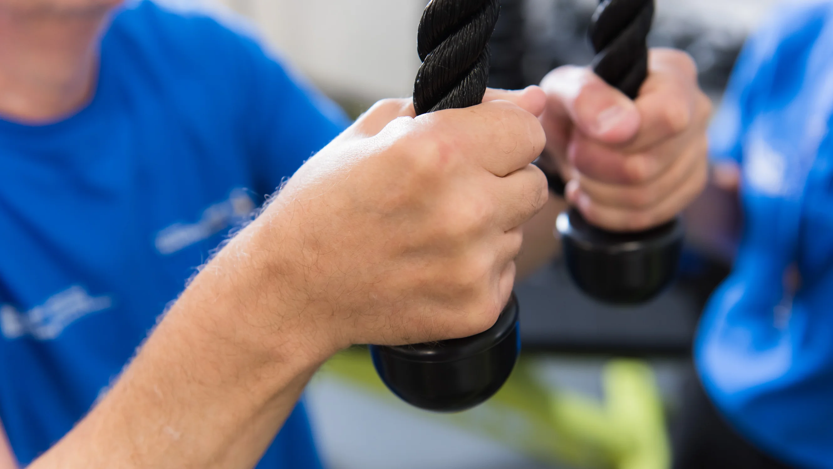 Person pulling on weights