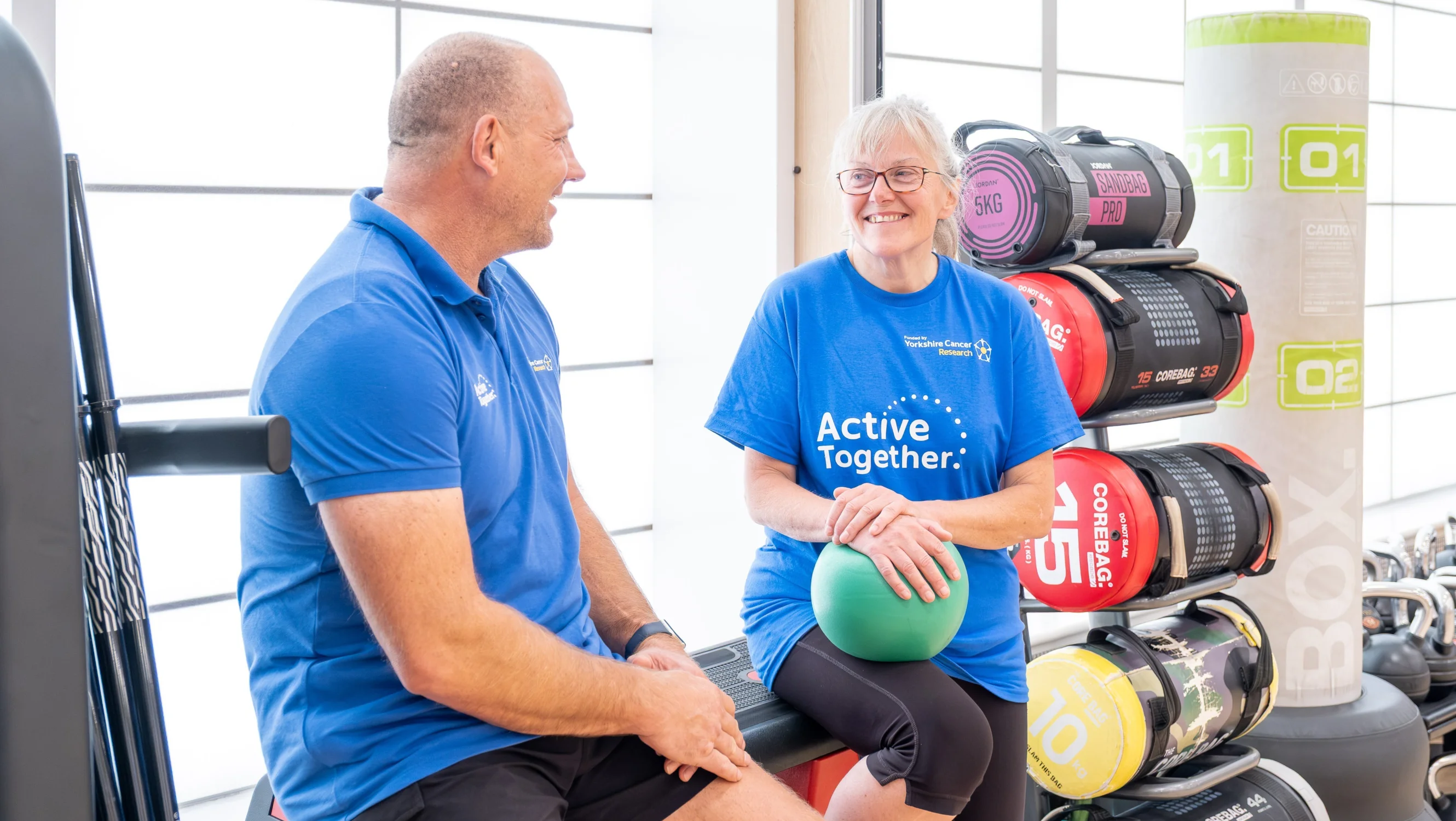 Active Together member and instructor talking