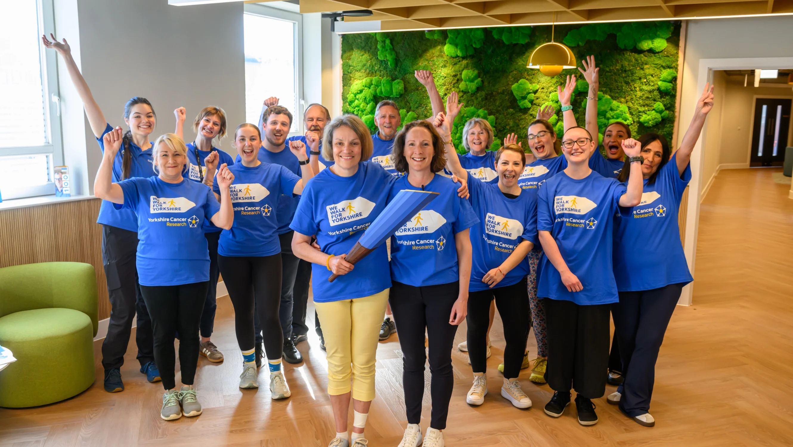 Group of Active Together team, members and people with cancer together for a photo at the Active Together centre in Hull