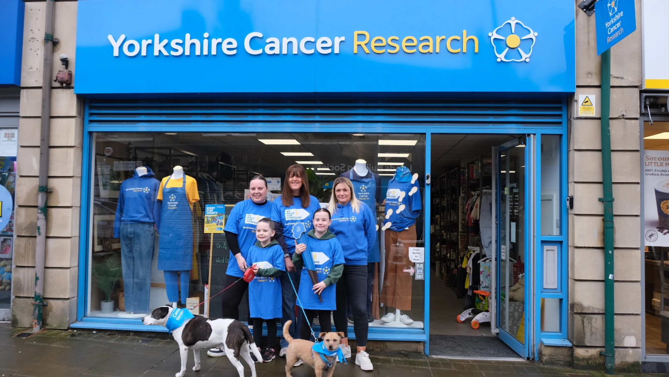 Karen, Jade and their family outside of the Yeadon shop