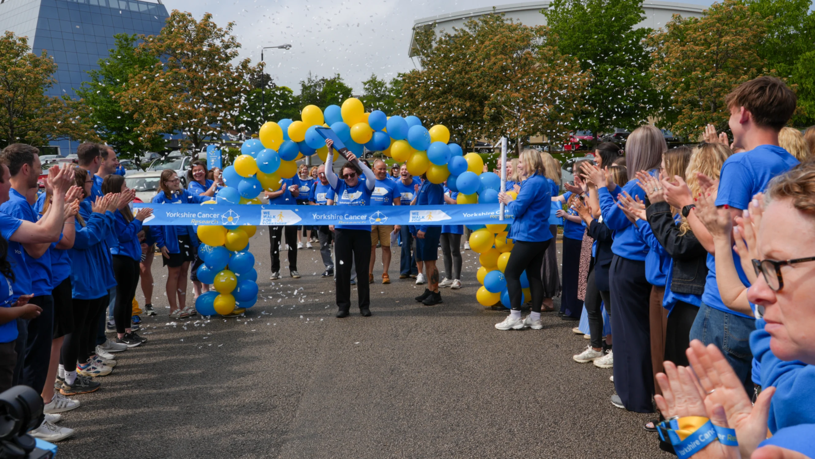 Katie crosses the finish line of the baton relay