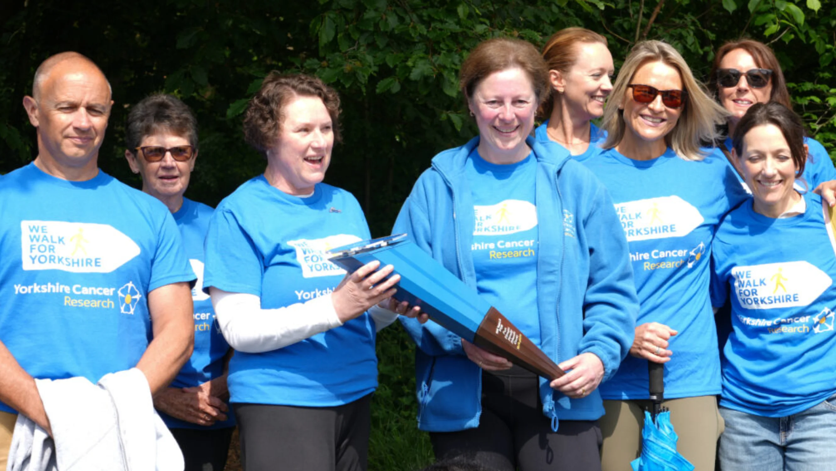 Lisa handing over the baton to Katie