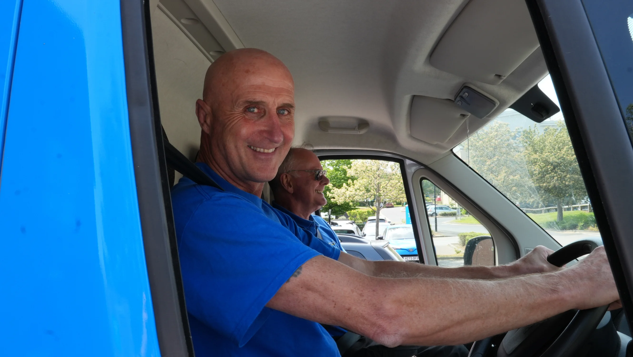 Alastair sitting in the Yorkshire Cancer Research van