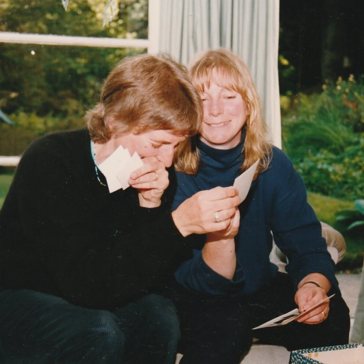 Sue and Polly laughing at photos 1993