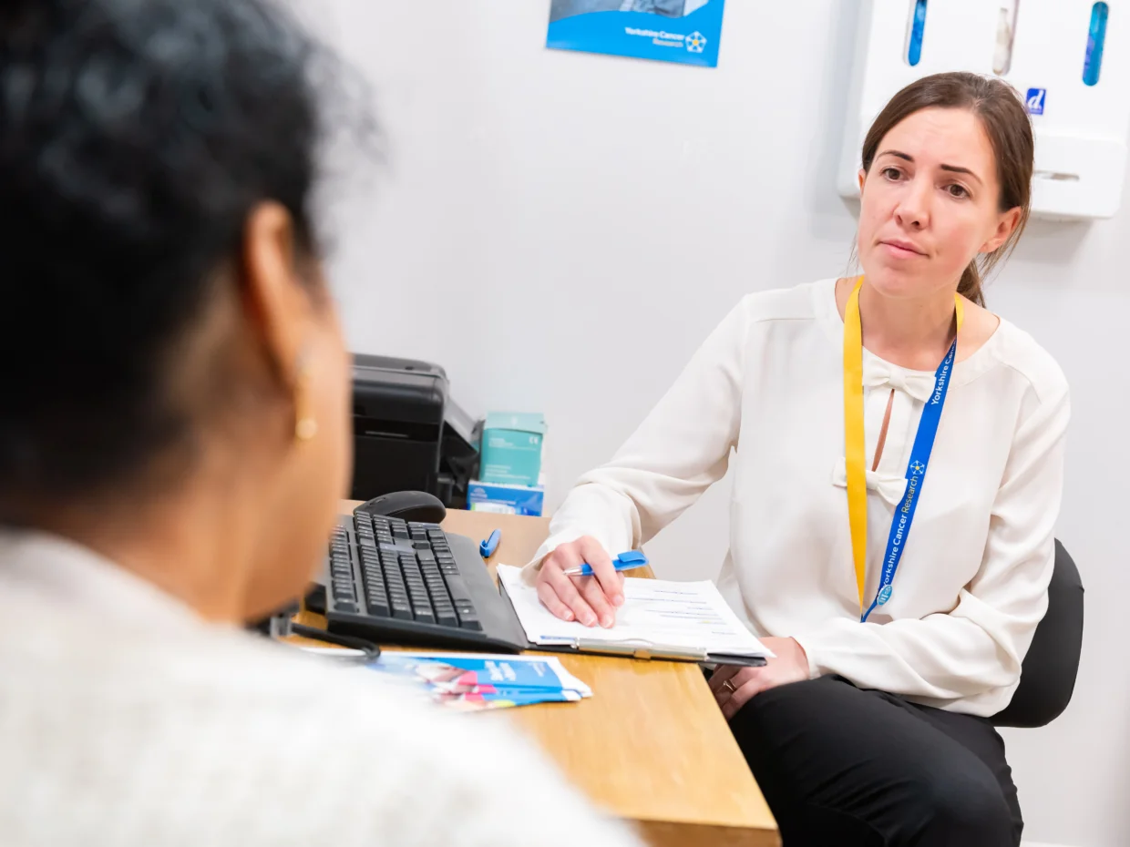 Female GP speaking to a patient