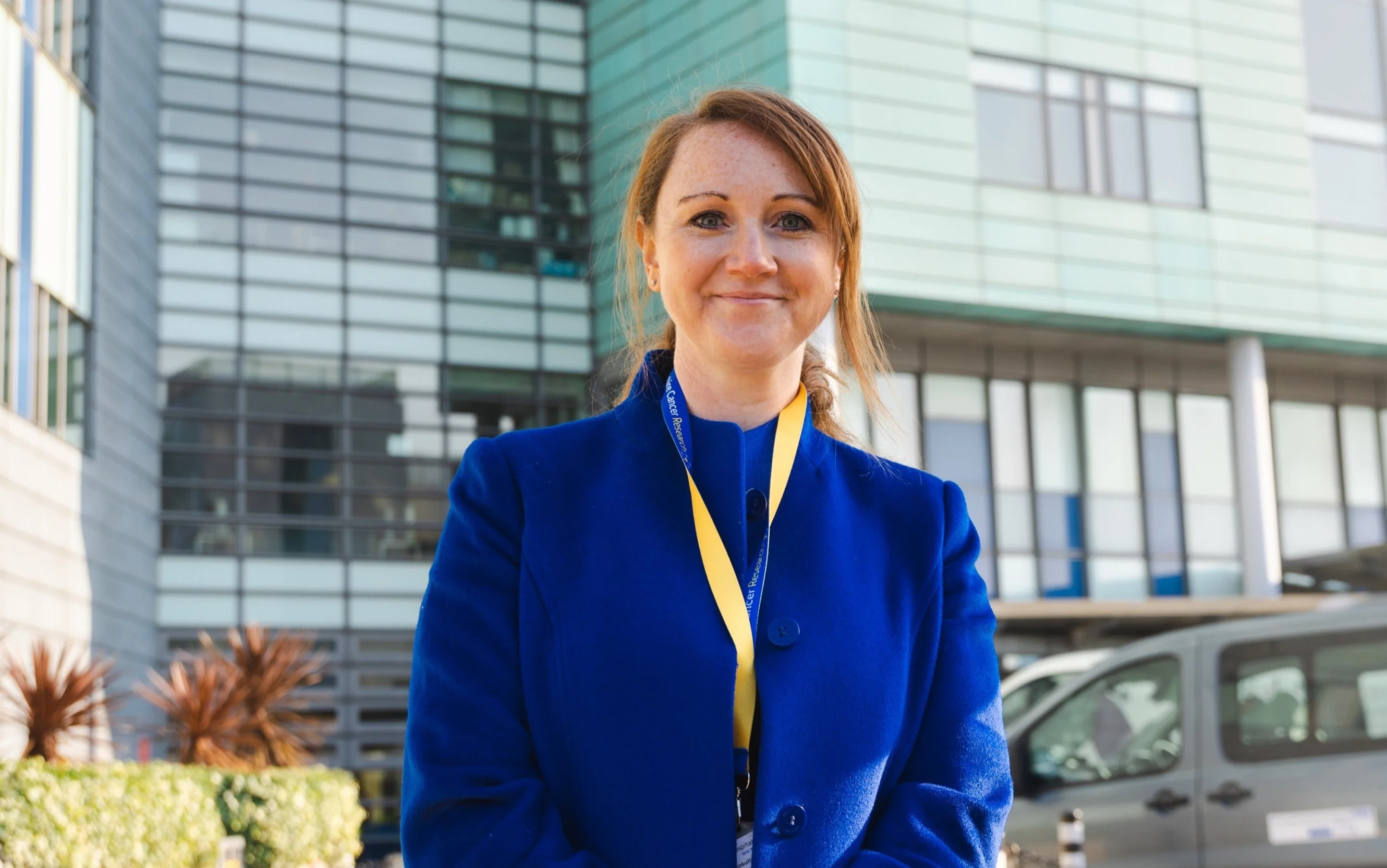 Dr Jenny Seligman standing outside hospital building
